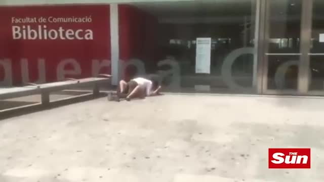 Couple-caught-having-s_x-in-broad-daylight-outside-library-in-Barcelona182733c4546033626.mp4