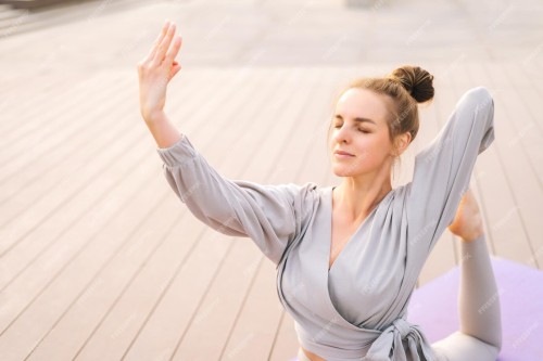 croppped-shot-flexible-caucasian-young-yogini-woman-sportswear-performing-yoga-pigeon-pose-outdoors-sitting-yoga-mat_482921-7660c9baf99aaae15f7c.jpg